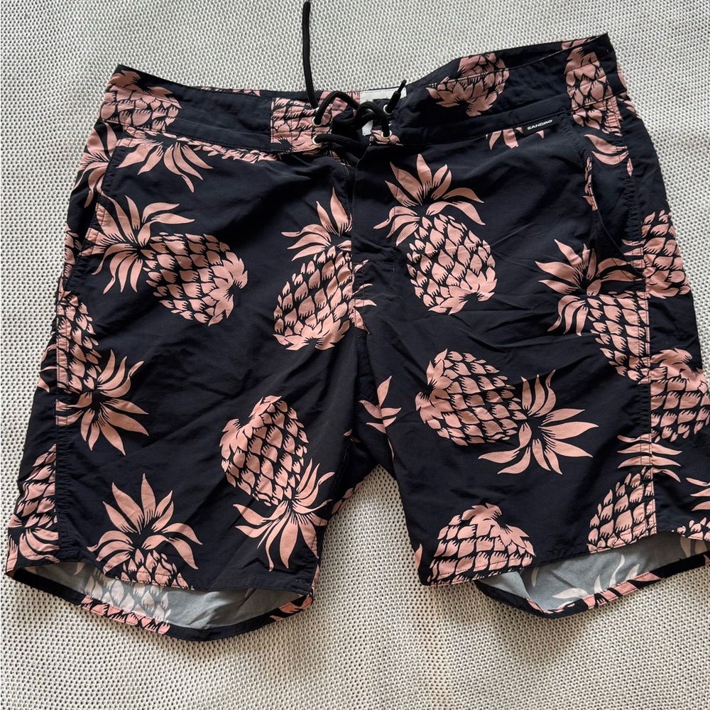 Sandro Black and Pink Board Shorts with Tropical Flair